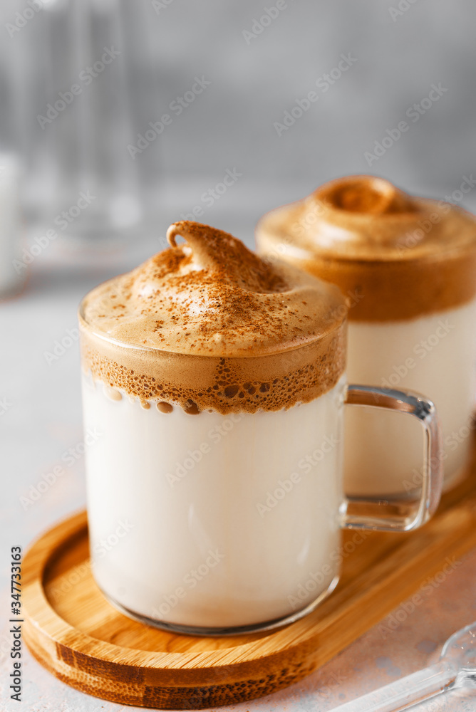 Dalgona Coffee two small cups close up ,Korean trend home made coffee Dalgona Coffee two small cups close up ,Korean trend home made coffee