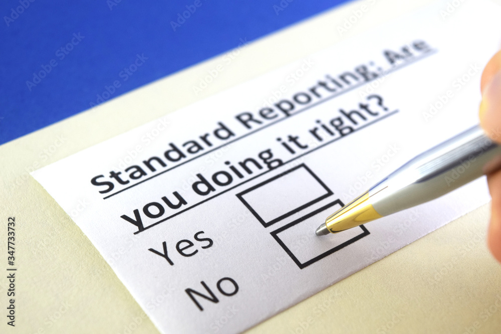 One person is answering question about standard reporting. One person is answering question about standard reporting.