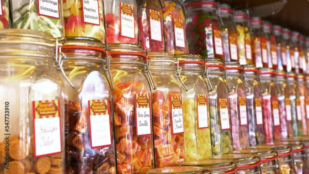 Sweet colorful candy, bonbon in classic glasses.