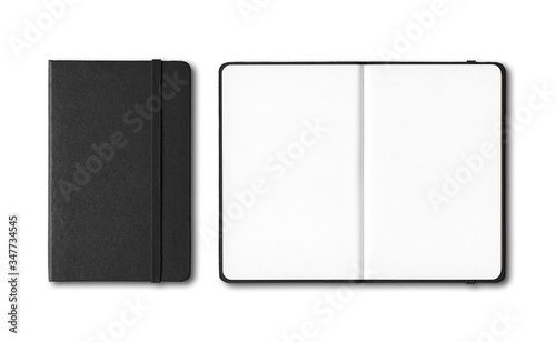 Black closed and open notebooks isolated on white