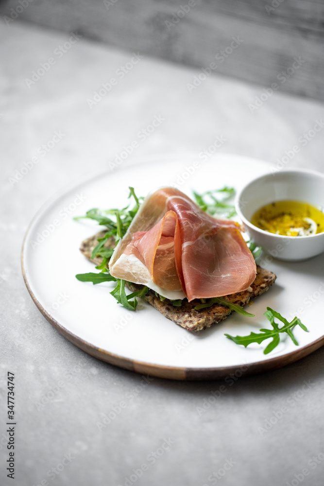 iberico ham sandwich on marble background with copy space iberico ham sandwich on marble background with copy space