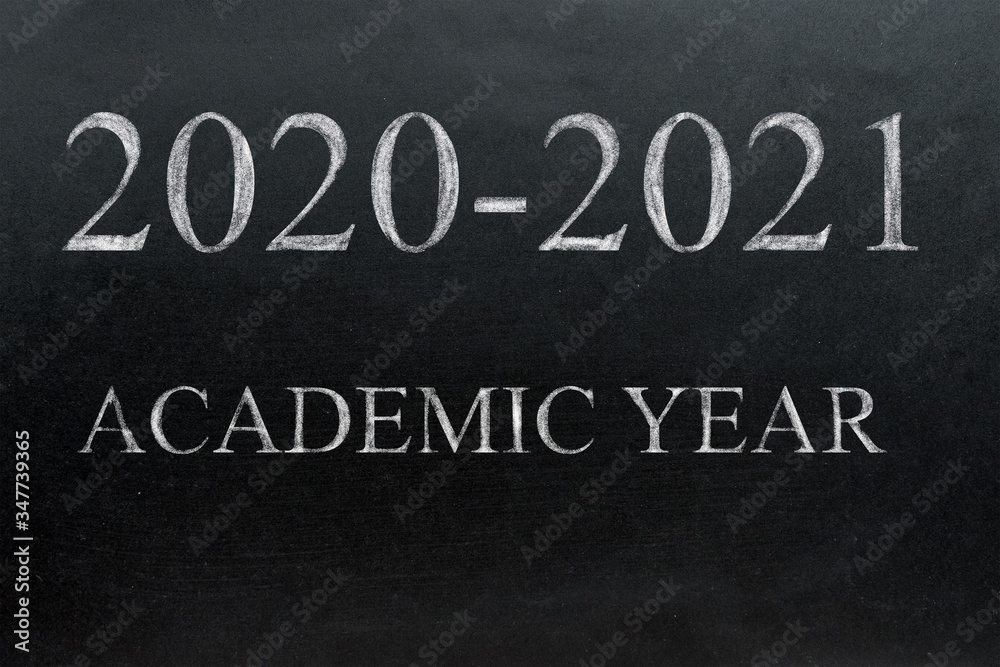 Fototapeta premium School board with the text academic year 2020 2021. Background School blackboard. Beginning of the school year.