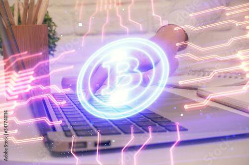 Double exposure of woman hands typing on computer and crypto market theme hologram drawing. Blockchain concept.