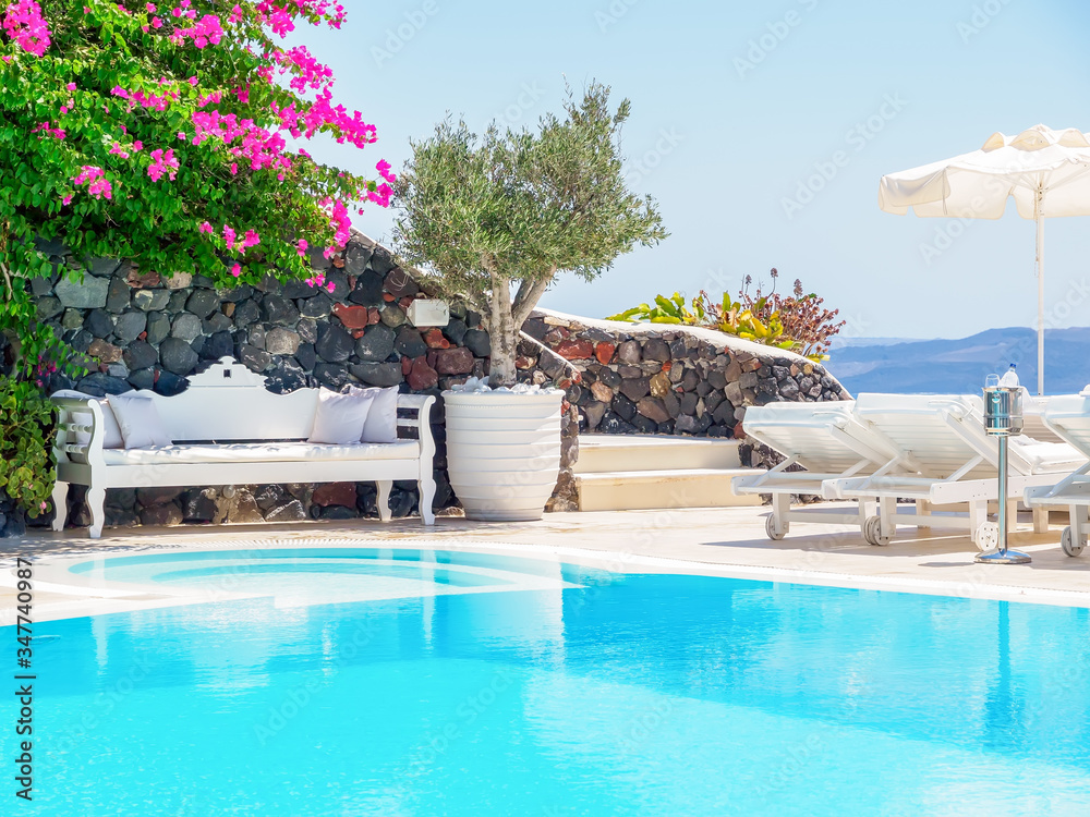 Santorini hotel terrace view. Luxury vacations. Cyclades, Greece.