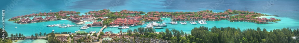 Aerial panoramic view of Mahe coastline, Seychelles Islands. Luxury Eden Island from Victoria viewpoint on a sunny day