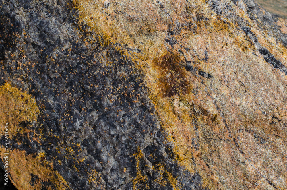 Granite. The structure of the stone. Rock. Granite. The structure of the stone. Rock.
