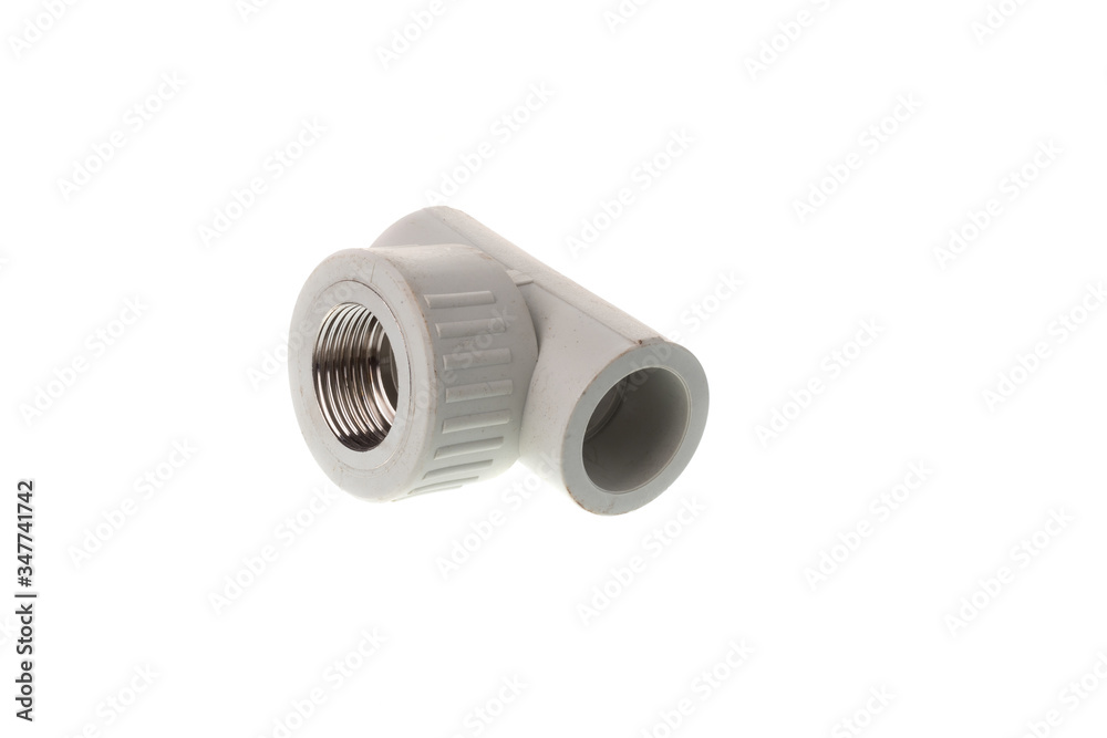 Plastic PPR T shape with metal thread fitting and ribbed neck for water pipes, isolated on white background Plastic PPR T shape with metal thread fitting and ribbed neck for water pipes, isolated on white background