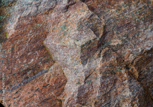 Granite. The structure of the stone. Rock.