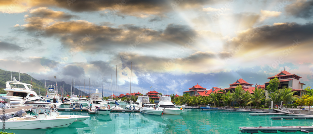 Fototapeta premium Beautiful port of Mahe, Seychelles. Panoramic view at sunset. Eden Island