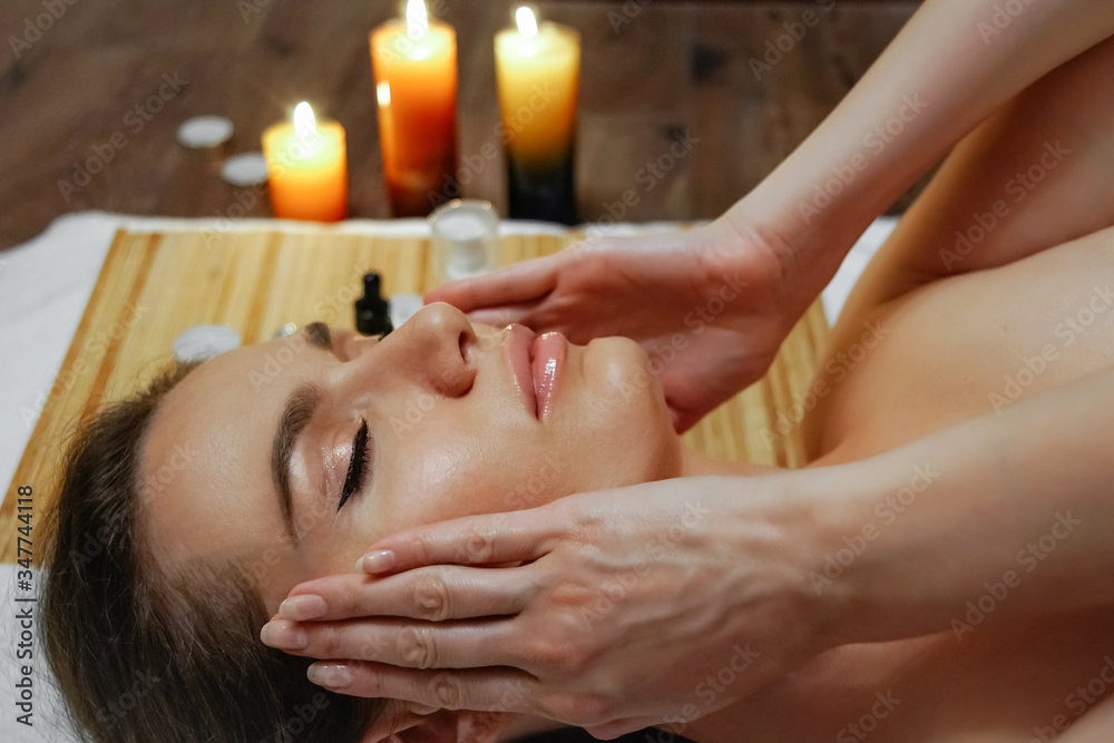 Beautiful young woman in spa, relaxation, relaxing massage in a beauty salon Beautiful young woman in spa, relaxation, relaxing massage in a beauty salon