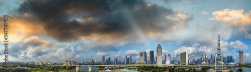 Panoramic aerial view of Singapore skyline from a drone point of view at dusk