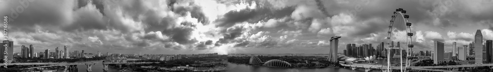 Black and white panoramic aerial view of Singapore skyline from a drone point of view Black and white panoramic aerial view of Singapore skyline from a drone point of view