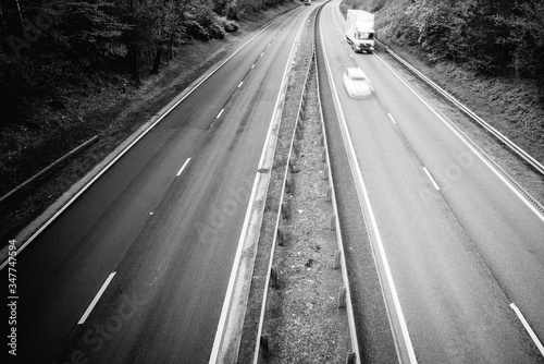 Dual motorway and blurred vehicles speeding - accidents on roads photo