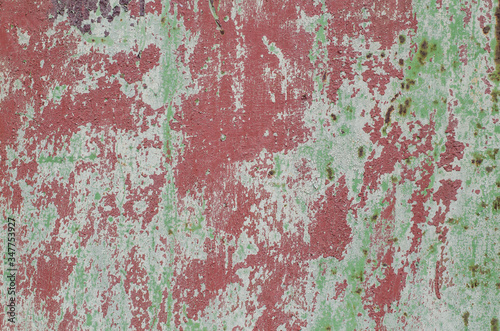 Iron fence. Rusty surface. Old, peeling paint.
