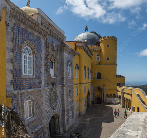 beautiful yellow castle Pena Palace romanticist castle in sao pedro de penaferim sintra