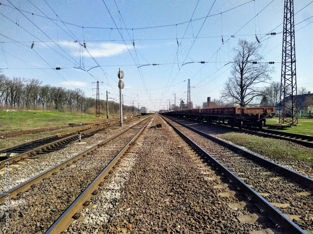 Railroad in rural countryside at sunny spring day