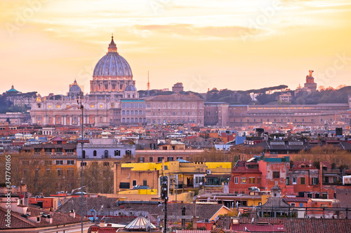 Eternal city of Rome rooftops and Vatican Basilica of Saint Peter golden sunset view © xbrchx
