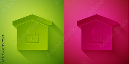 Paper cut House under protection icon isolated on green and pink background. Home and lock. Protection, safety, security, protect, defense concept. Paper art style. Vector Illustration