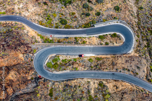 A unique road among high mountains in a beautiful mood of nature