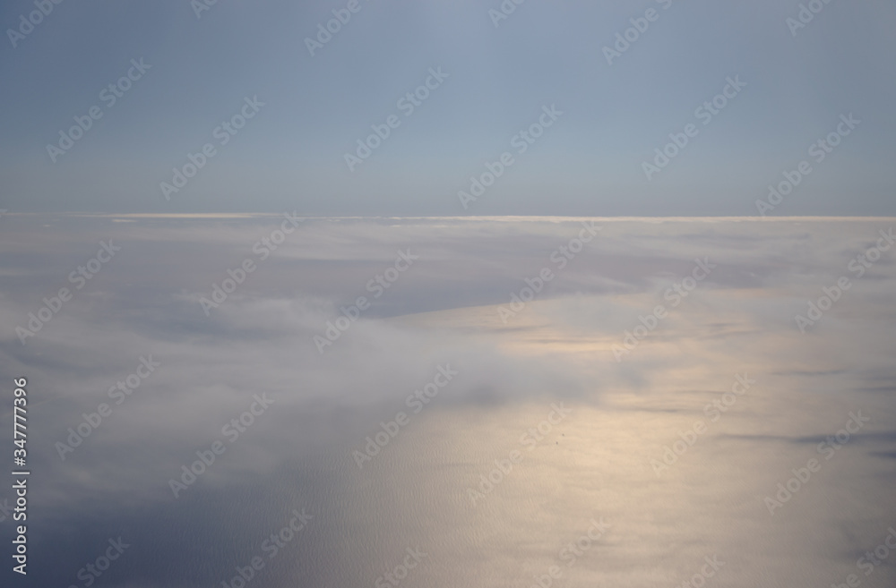 Photo from the plane with seaside in blue color. Mystic view from above. Meditarian sea.