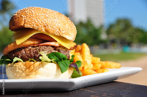 Burger and chips on the beach