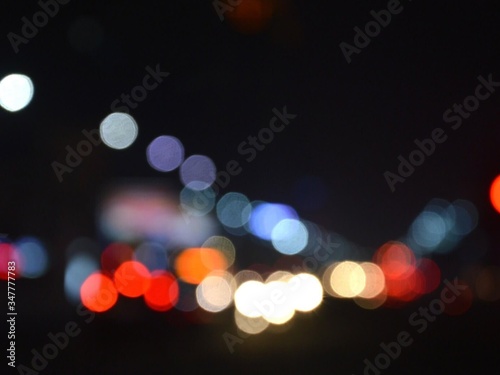 Colorful lights on dark background © Choukun kub