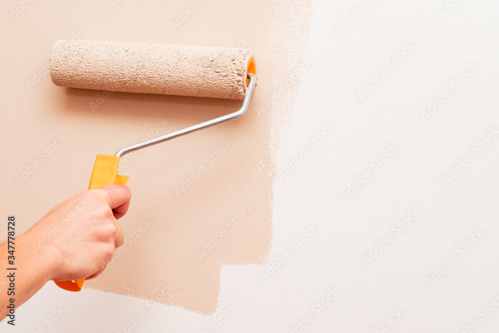Obraz premium Painting the Wall