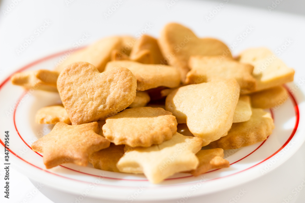 Homemade butter cookies on a dish in beautiful sunlight Homemade butter cookies on a dish in beautiful sunlight