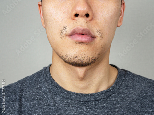 Asian man beard or facial hair - close up shot