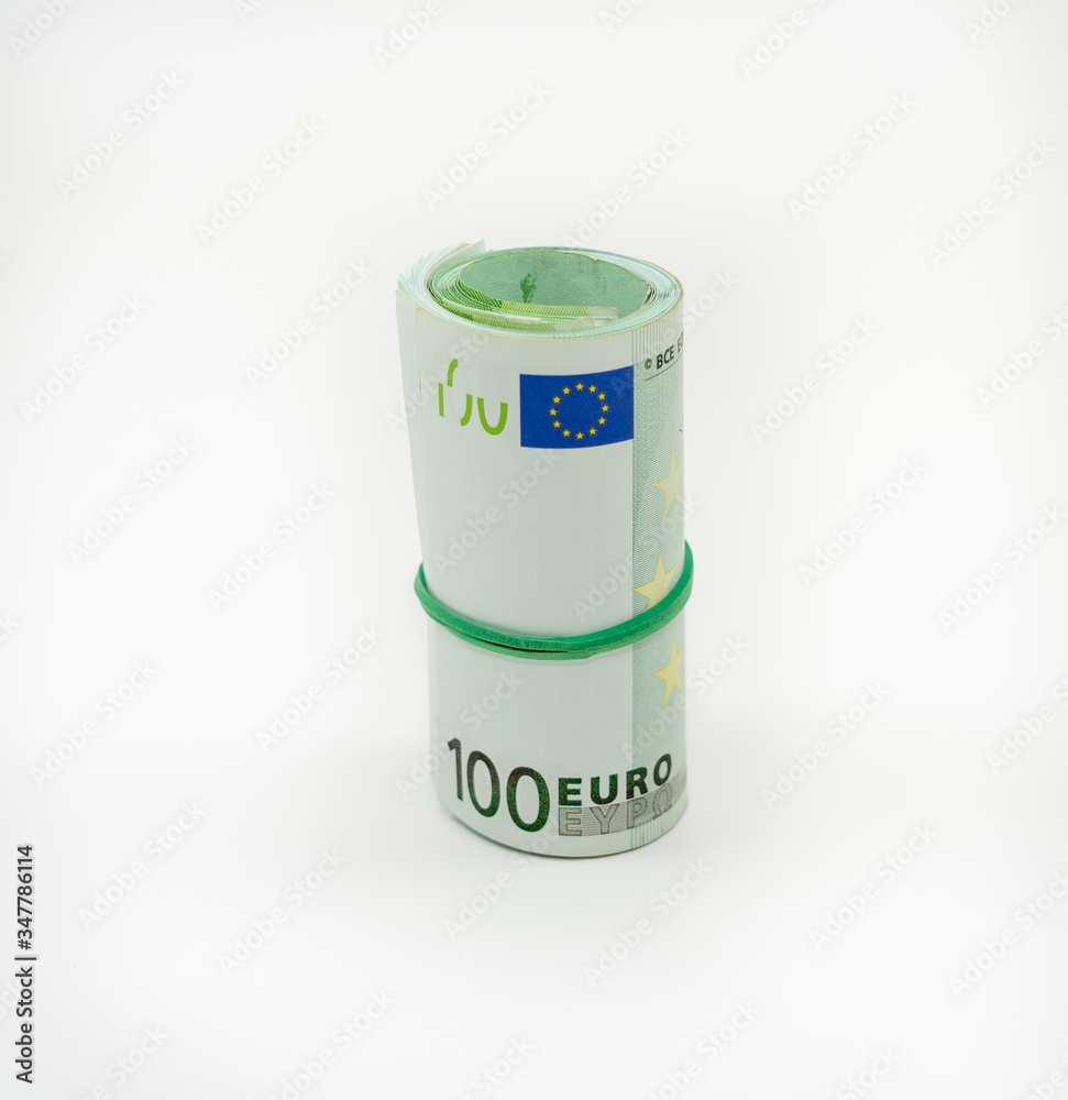 Banknotes one hundred 100 euros in a roll with an elastic band. European currency to save. Close-up, white background. The concept of the safety of deposits and money... Banknotes one hundred 100 euros in a roll with an elastic band. European currency to save. Close-up, white background. The concept of the safety of deposits and money...