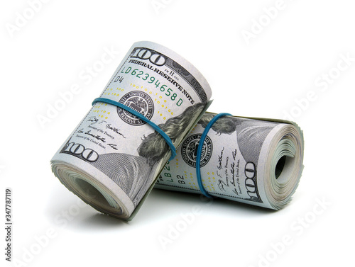 Obraz na płótnie dollar bills knitted by a rubber band isolated on white background w salonie