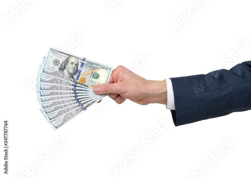 Man's hand in suit giving of money isolated on white