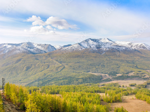 Kanas Lake in Xinjiang, China, located in a valley in the snow covered Altai Mountains, near the very northern tip of Xinjiang, and the province's borders with Kazakhstan, Mongolia, and Russia