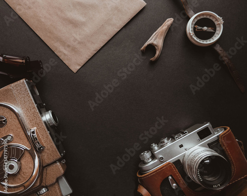 Travel mock up /explore mockup with vintage camera, hat, scape for text. Adventure template with retro elements, explorer kit, holiday hipster traveler mock-up. Working desk branding mock up top view.