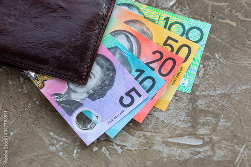 Australian bank notes in brown wallet.  