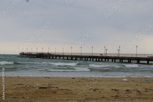 The black sea during a spring storm. The waves are rising high. Clouds hang low over the water.