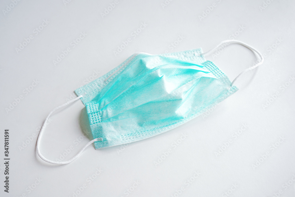 Mask and corona virus isolated on a white background Mask and corona virus isolated on a white background