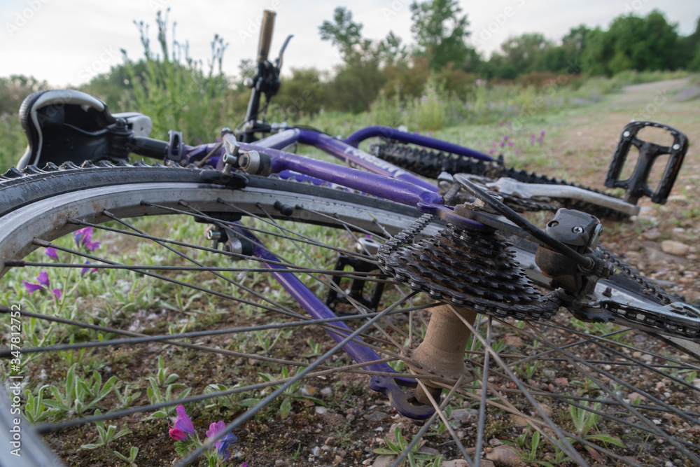 Perspective of old mountain bike lying on the ground Perspective of old mountain bike lying on the ground