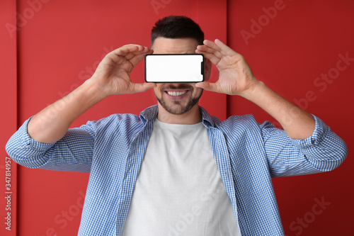 Handsome man with mobile ph...