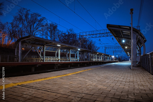 Empty railway station at dusk
