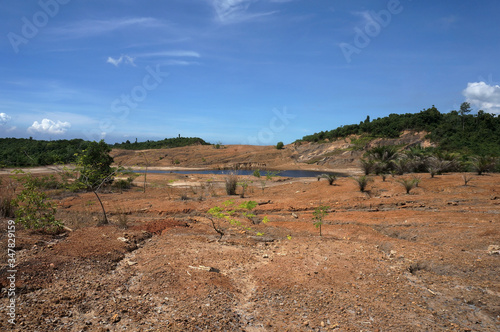 The Impact of coal mining on the environment. The mining location was abandoned without reclamation. Location: Sangatta, East Kalimantan/Indonesia.    