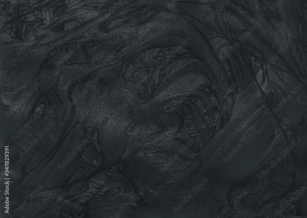 Black natural texture liquid cosmetic activated charcoal or volcanic clay with scrub effect for face mask and body. Trendy background. Black natural texture liquid cosmetic activated charcoal or volcanic clay with scrub effect for face mask and body. Trendy background.