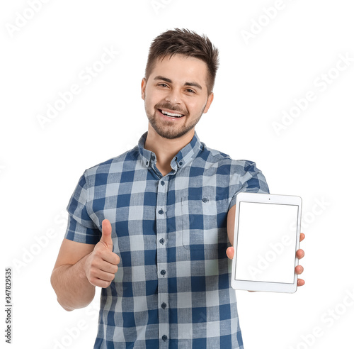 Young man with tablet compu...