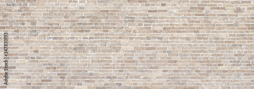 Brick wall beige stone panorama background photo