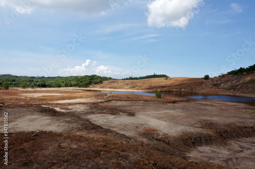 The Impact of coal mining on the environment. The mining location was abandoned without reclamation. Location: Sangatta, East Kalimantan/Indonesia. 