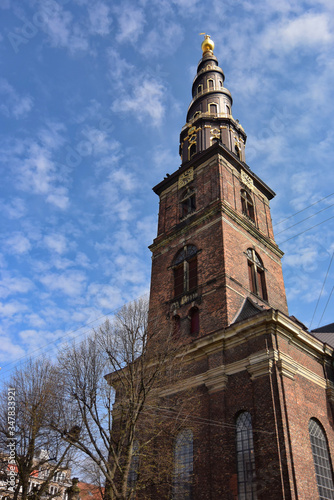 Photography コペンハーゲンの古い街並み。青空に伸びる尖塔。Copenhagen Our Saviour's (Vor Frelsers Kirke) - one of De