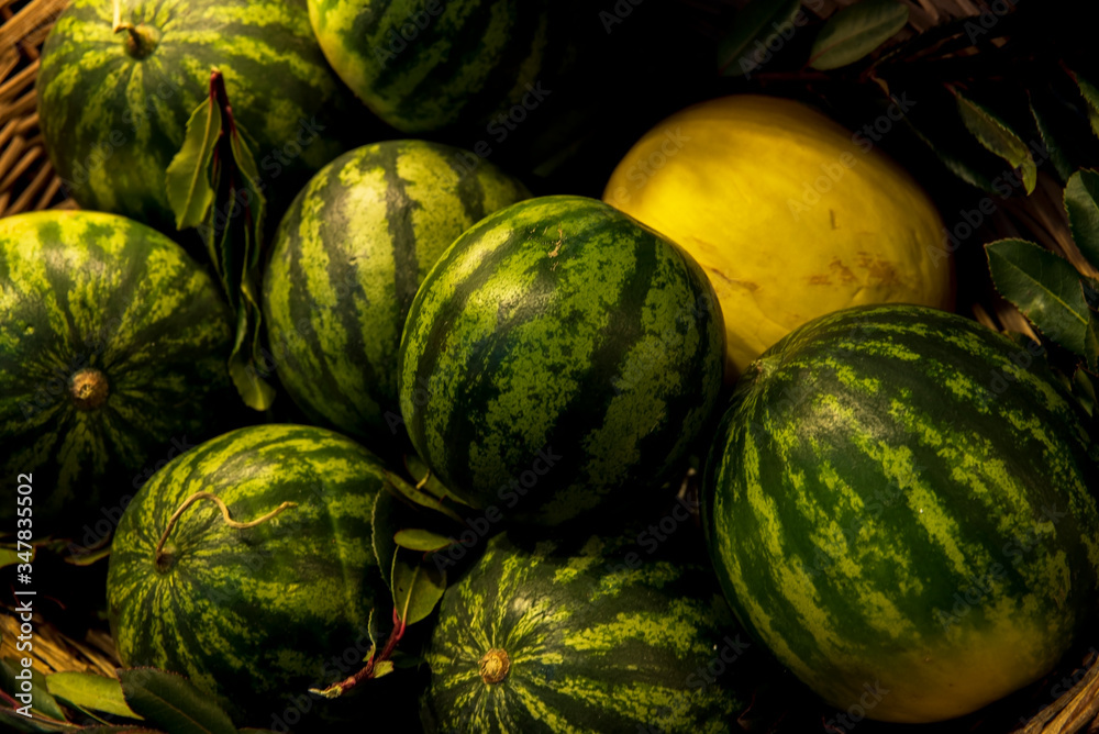 A pile of watermelons, on sale in grocery