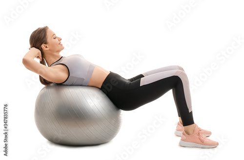 Sporty young woman training...