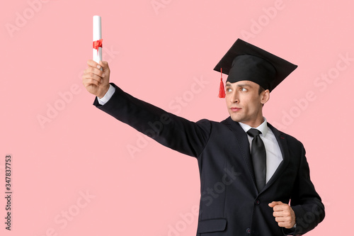 Young man in graduation hat...