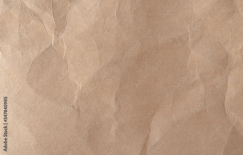 Obraz premium Brown crumpled paper texture background.